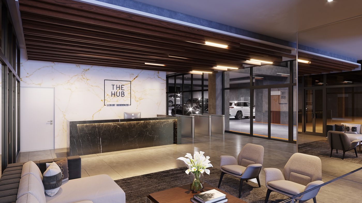 Double-height lobby with valet